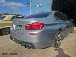 2016 BMW M5 with VIN WBSFV9C56GG343672, listed as a Copart auction lot 44406554 with 84,402 mi miles. Bid and sale history available at carsss.com. Image 4.