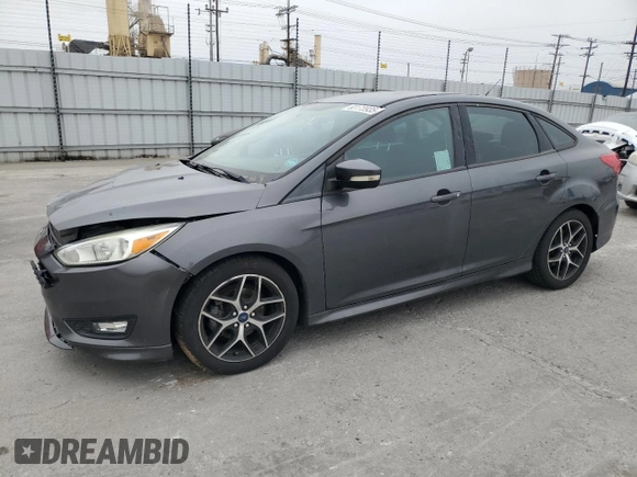 2016 Ford Focus SE z VIN 1FADP3F23GL405565, wystawiony jako Copart lot #60173935 z przebiegiem 82 167 mil mil oraz Szkoda całkowita • Salvage title. Historia ofert i sprzedaży dostępna na DreamBid. Obrazek 1.