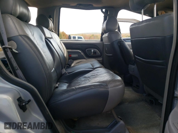 2000 GMC Denali z VIN 1GKEK13R2YR138523, wystawiony jako Copart lot #77609804 z przebiegiem 203 514 mil mil oraz Szkody całkowita. Historia ofert i sprzedaży dostępna na DreamBid. Obrazek 12.
