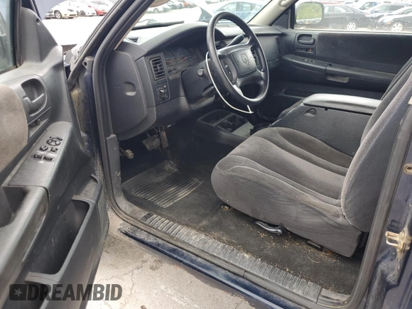 2002 Dodge Dakota z VIN 1B7GG32X32S546515, wystawiony jako Copart lot #57888695 z przebiegiem 81 202 mil mil oraz Szkoda całkowita • Salvage title. Historia ofert i sprzedaży dostępna na DreamBid. Obrazek 8.