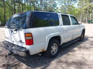 2003 Chevrolet Suburban LS with VIN 3GNEC16Z73G281147, listed as a IAAI auction lot 42048743 with 314,477 mi miles. Bid and sale history available at carsss.com. Image 4.