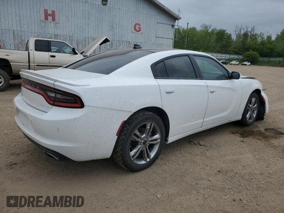 2015 Dodge Charger SXT with VIN 2C3CDXJG7FH779296, listed as a Copart auction lot 58490215 with 173,371 mi miles and Clean title. Bid and sale history available at DreamBid. Image 3.