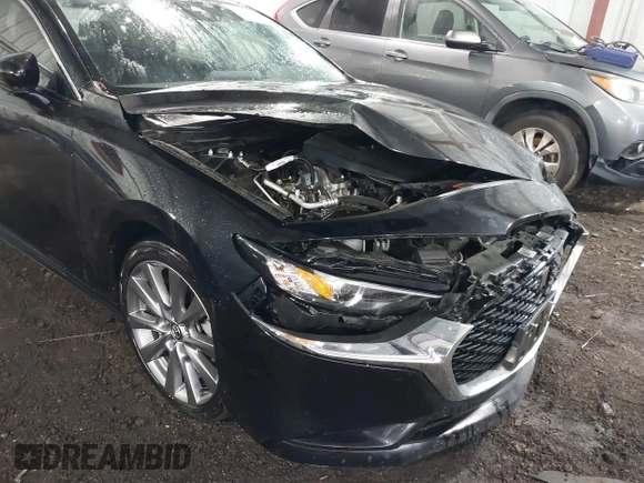 2023 Mazda 3 S Preferred with VIN 3MZBPACM0PM352430, listed as a IAAI auction lot 41738230 with 17,632 mi miles and . Bid and sale history available at DreamBid. Image 6.