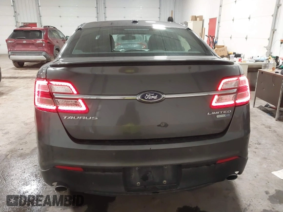 2015 Ford Taurus Limited with VIN 1FAHP2J86FG106828, listed as a IAAI auction lot 41748997 with 221,216 mi miles. Bid and sale history available at carsss.com. Image 16.