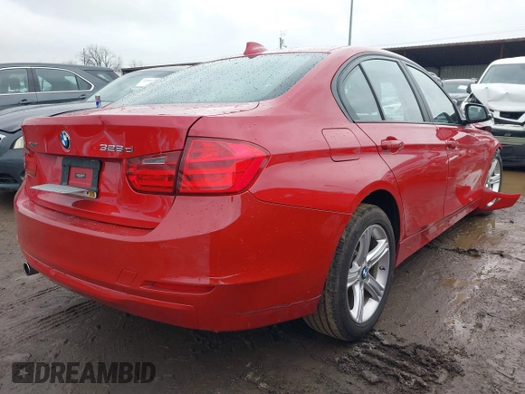 2014 BMW 3 Series 328d xDrive with VIN WBA3D5C51EKX97440, listed as a IAAI auction lot 41576050 with 124,242 mi miles. Bid and sale history available at carsss.com. Image 4.