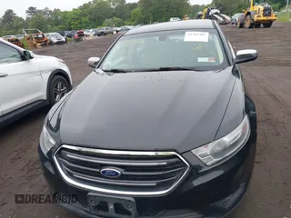 2014 Ford Taurus Limited z VIN 1FAHP2J8XEG112310, wystawiony jako IAAI lot #42367397 z przebiegiem 77 329 mil mil oraz . Historia ofert i sprzedaży dostępna na DreamBid. Obrazek 6.