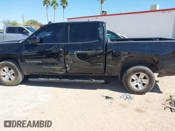 2018 Chevrolet Silverado 1500 LT with VIN 3GCPCREC9JG569925, listed as a IAAI auction lot 42086625 with 184,594 mi miles and . Bid and sale history available at DreamBid. Image 14.