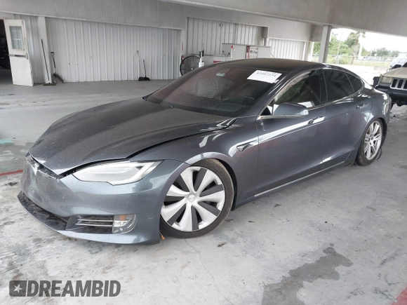 2021 Tesla Model S Long Range Plus with VIN 5YJSA1E28MF421655, listed as a IAAI auction lot 42407234 with 111,443 mi miles and . Bid and sale history available at DreamBid. Image 2.