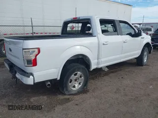 2019 Ford F-150 XL with VIN 1FTEW1E53KKE13293, listed as a IAAI auction lot 41449185 with 68,215 mi miles. Bid and sale history available at carsss.com. Image 4.
