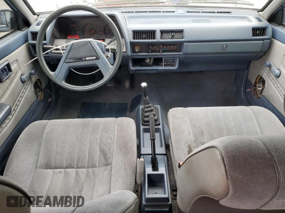 1985 Nissan Sentra z VIN JN1PB15S6FU172045, wystawiony jako Copart lot #54384475 z przebiegiem 134 117 mil mil oraz Szkoda całkowita • Salvage title. Historia ofert i sprzedaży dostępna na DreamBid. Obrazek 8.