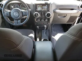 2013 Jeep Wrangler Sahara z VIN 1C4AJWBG5DL566559, wystawiony jako Copart lot #54823405 z przebiegiem 134 099 mil mil oraz Szkoda całkowita • Salvage title. Historia ofert i sprzedaży dostępna na DreamBid. Obrazek 8.