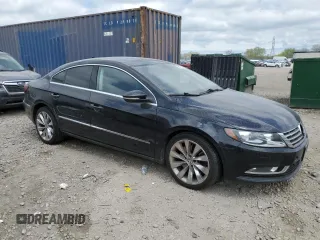 2013 Volkswagen CC Executive z VIN WVWGU7AN0DE529415, wystawiony jako Copart lot #56127135 z przebiegiem 131 345 mil mil oraz Tytuł czysty. Historia ofert i sprzedaży dostępna na DreamBid. Obrazek 4.