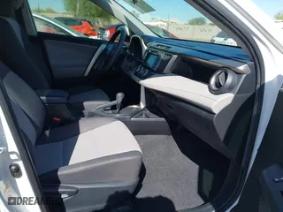 2014 Toyota RAV4 LE with VIN JTMBFREV8ED090319, listed as a IAAI auction lot 41980043 with 163,033 mi miles. Bid and sale history available at carsss.com. Image 5.