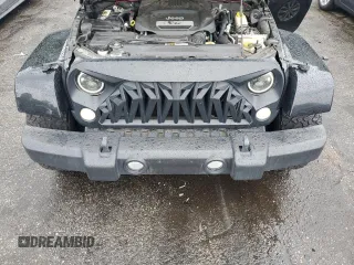 2015 Jeep Wrangler Unlimited Sahara with VIN 1C4BJWEG6FL643460, listed as a Copart auction lot 58557765 with 130,181 mi miles and Salvage title. Bid and sale history available at DreamBid. Image 11.