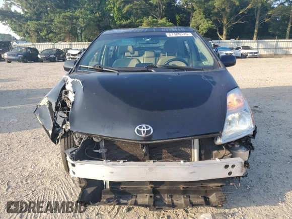 2007 Toyota Prius z VIN JTDKB20UX77600124, wystawiony jako Copart lot #61400525 z przebiegiem 102 957 mil mil oraz Czysty tytuł • Clean title. Historia ofert i sprzedaży dostępna na DreamBid. Obrazek 5.