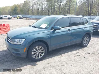 2019 Volkswagen Tiguan S with VIN 3VV1B7AX2KM131063, listed as a IAAI auction lot 41937501 with 59,402 mi miles. Bid and sale history available at carsss.com. Image 2.