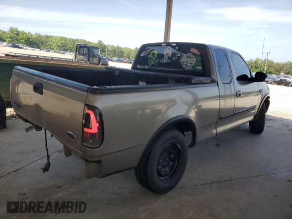 2001 Ford F-150 XL с VIN 1FTRX17L61NB04439, выставлен на аукционе Copart как лот 57389125 с пробегом Не указан миль и Списание • Salvage title. История ставок и продаж доступна на DreamBid. Изображение 3.