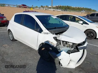 2015 Toyota Yaris L with VIN VNKKTUD38FA046276, listed as a IAAI auction lot 41398583 with 201,879 mi miles. Bid and sale history available at carsss.com. Image 1.