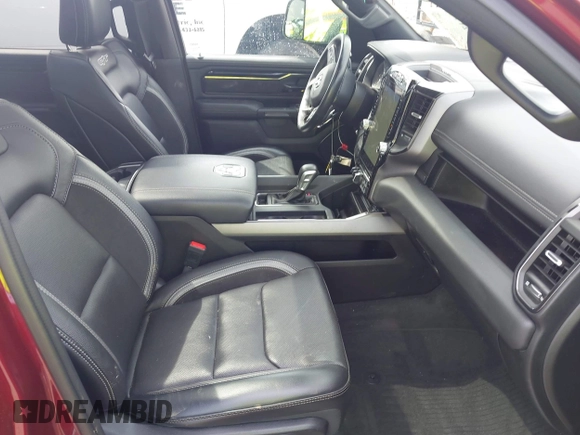 2022 Ram 1500 Laramie z VIN 1C6SRFJT0NN333200, wystawiony jako IAAI lot #42217219 z przebiegiem 27 332 mil mil oraz . Historia ofert i sprzedaży dostępna na DreamBid. Obrazek 5.