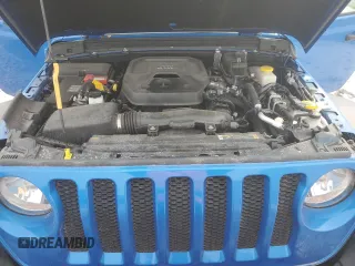 2023 Jeep Wrangler Sport S with VIN 1C4HJXDN5PW573692, listed as a Copart auction lot 42982875 with 25,584 mi miles and Salvage Title. Bid and sale history available at DreamBid. Image 12.