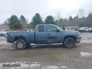 2011 GMC Sierra 1500 SLE with VIN 1GTR2VE3XBZ398625, listed as a IAAI auction lot 42090863 with 299,115 mi miles. Bid and sale history available at carsss.com. Image 13.