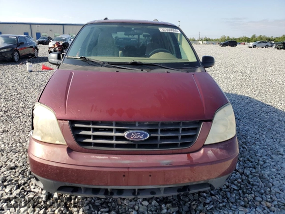 2006 Ford Freestar SE z VIN 2FMZA51636BA02932, wystawiony jako Copart lot #52506005 z przebiegiem 74 512 mil mil oraz Szkody całkowita. Historia ofert i sprzedaży dostępna na DreamBid. Obrazek 5.