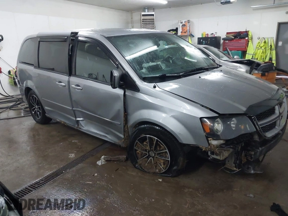 2015 Dodge Grand Caravan SE with VIN 2C4RDGBG9FR703691, listed as a IAAI auction lot 41395564 with 170,735 mi miles and . Bid and sale history available at DreamBid. Image 1.