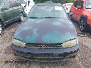 1993 Toyota Camry LE z VIN 4T1SK12E6PU248270, wystawiony jako IAAI lot #42160426 z przebiegiem 225 221 mil mil oraz . Historia ofert i sprzedaży dostępna na DreamBid. Obrazek 6.