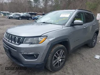 2018 Jeep Compass Altitude with VIN 3C4NJDBB1JT435428, listed as a IAAI auction lot 42050993 with 114,328 mi miles and . Bid and sale history available at DreamBid. Image 2.