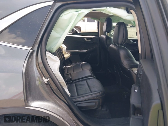 2020 Ford Escape Titanium with VIN 1FMCU9J94LUB19570, listed as a IAAI auction lot 42134031 with 110,248 mi miles and . Bid and sale history available at DreamBid. Image 8.