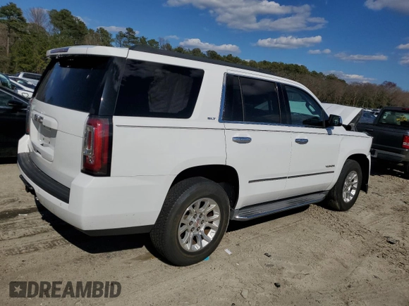 2015 GMC Yukon SLT with VIN 1GKS2BKC4FR143581, listed as a Copart auction lot 50591645 with 0 mi miles and Salvage Title. Bid and sale history available at carsss.com. Image 3.