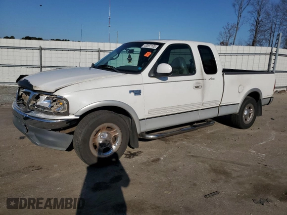 2000 Ford F-150 XL with VIN 1FTRX17L1YNA26050, listed as a Copart auction lot 43597105 with 205,152 mi miles and Salvage Title. Bid and sale history available at carsss.com. Image 1.