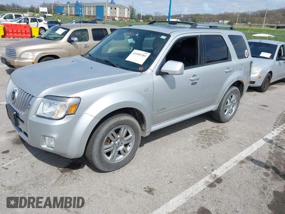 2008 Mercury Mariner Premier with VIN 4M2CU97198KJ12620, listed as a IAAI auction lot 41909389 with 131,884 mi miles and . Bid and sale history available at DreamBid. Image 2.
