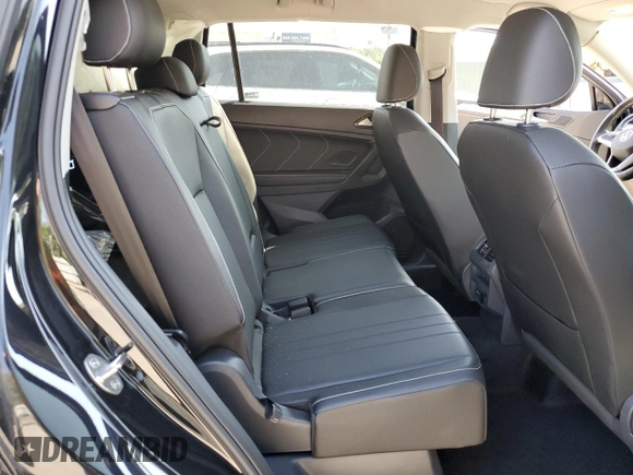 2023 Volkswagen Tiguan SE z VIN 3VV3B7AX9PM134218, wystawiony jako Copart lot #54731705 z przebiegiem 9 460 mil mil oraz Szkoda całkowita • Salvage title. Historia ofert i sprzedaży dostępna na DreamBid. Obrazek 11.