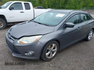 2012 Ford Focus SE with VIN 1FAHP3F2XCL458016, listed as a IAAI auction lot 42320697 with 235,248 mi miles and . Bid and sale history available at DreamBid. Image 2.