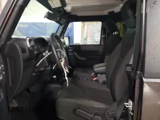 2018 Jeep Wrangler Sport S z VIN 1C4GJWAG5JL851446, wystawiony jako Copart lot #47296905 z przebiegiem 63 043 mil mil oraz Szkoda całkowita • Salvage title. Historia ofert i sprzedaży dostępna na DreamBid. Obrazek 7.