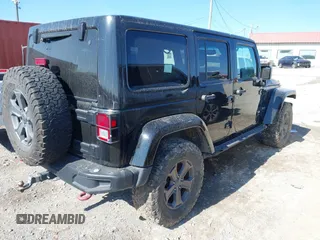 2017 Jeep Wrangler Unlimited Rubicon Recon с VIN 1C4HJWFG0HL737779, выставлен на аукционе IAAI как лот 41396395 с пробегом 125 845 миль миль и . История ставок и продаж доступна на DreamBid. Изображение 4.
