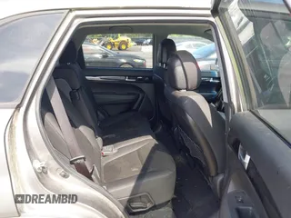 2014 Kia Sorento LX with VIN 5XYKT3A60EG486699, listed as a IAAI auction lot 42143270 with 127,190 mi miles and . Bid and sale history available at DreamBid. Image 8.
