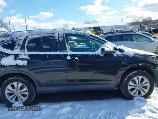 2014 Honda CR-V EX-L with VIN 2HKRM4H76EH659957, listed as a IAAI auction lot 41310681 with 256,784 mi miles. Bid and sale history available at carsss.com. Image 13.