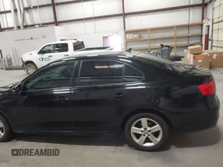 2014 Volkswagen Jetta SE with VIN 3VWD17AJ7EM409189, listed as a IAAI auction lot 42313804 with 139,950 mi miles and . Bid and sale history available at DreamBid. Image 14.