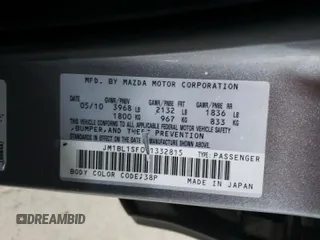 2010 Mazda 3 i SV with VIN JM1BL1SF0A1332815, listed as a Copart auction lot 87484534 with 121,187 mi miles and Salvage Title. Bid and sale history available at DreamBid. Image 12.