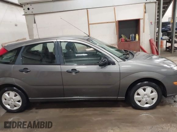2007 Ford Focus S with VIN 1FAFP37N87W333049, listed as a IAAI auction lot 41450683 with 307,869 mi miles and . Bid and sale history available at carsss.com. Image 13.