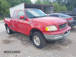 1997 Ford F-150 with VIN 1FTDX08W2VKC17809, listed as a IAAI auction lot 42541525 with 143,963 mi miles and . Bid and sale history available at DreamBid. Image 1.