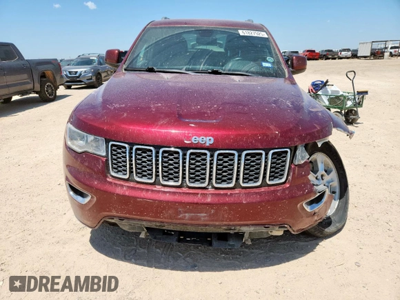 2017 Jeep Grand Cherokee Laredo with VIN 1C4RJFAG7HC693789, listed as a Copart auction lot 61827925 with 143,019 mi miles and Salvage title. Bid and sale history available at DreamBid. Image 5.
