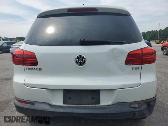 2017 Volkswagen Tiguan S with VIN WVGAV7AX7HK017576, listed as a Copart auction lot 58487455 with 100,034 mi miles and Salvage title. Bid and sale history available at DreamBid. Image 6.