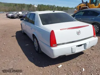 2007 Cadillac DTS Luxury I with VIN 1G6KD57Y17U126850, listed as a IAAI auction lot 41907481 with 123,977 mi miles. Bid and sale history available at carsss.com. Image 3.