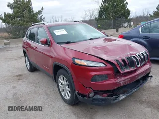 2015 Jeep Cherokee North with VIN 1C4PJMCS9FW674475, listed as a IAAI auction lot 41971771 with 186,376 mi miles. Bid and sale history available at carsss.com. Image 1.