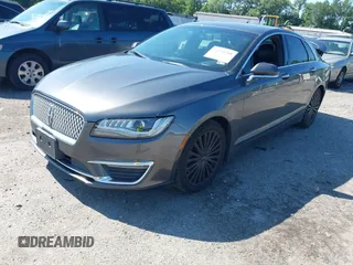 2017 Lincoln MKZ Reserve z VIN 3LN6L5E98HR653592, wystawiony jako IAAI lot #42531248 z przebiegiem 114 188 mil mil oraz . Historia ofert i sprzedaży dostępna na DreamBid. Obrazek 17.