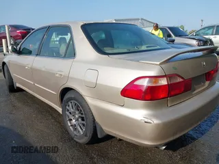 2000 Honda Accord EX z VIN 1HGCG1654YA078659, wystawiony jako IAAI lot #42430793 z przebiegiem 256 567 mil mil oraz . Historia ofert i sprzedaży dostępna na DreamBid. Obrazek 3.