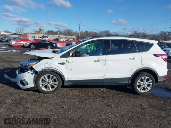 2017 Ford Escape SE with VIN 1FMCU9GD5HUE00425, listed as a IAAI auction lot 41843115 with 64,896 mi miles. Bid and sale history available at carsss.com. Image 14.